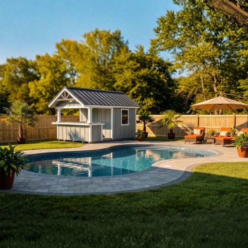 a pool house set next to a a beautiful pool